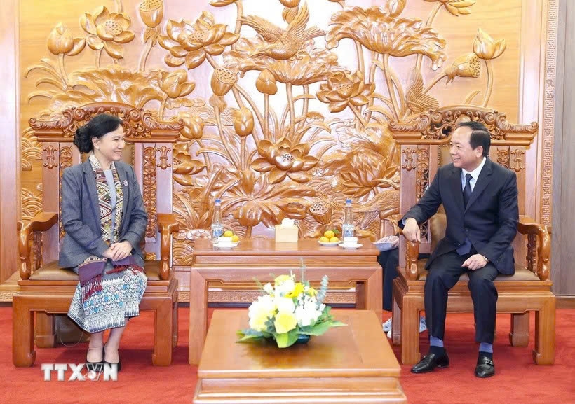 Vietnam and Laos pledge closer cooperation in mass mobilisation